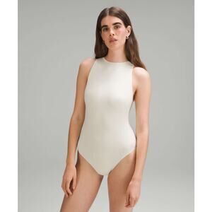 Lululemon Wundermost High Neck Bodysuit in Nomad Beige Size XS NWT